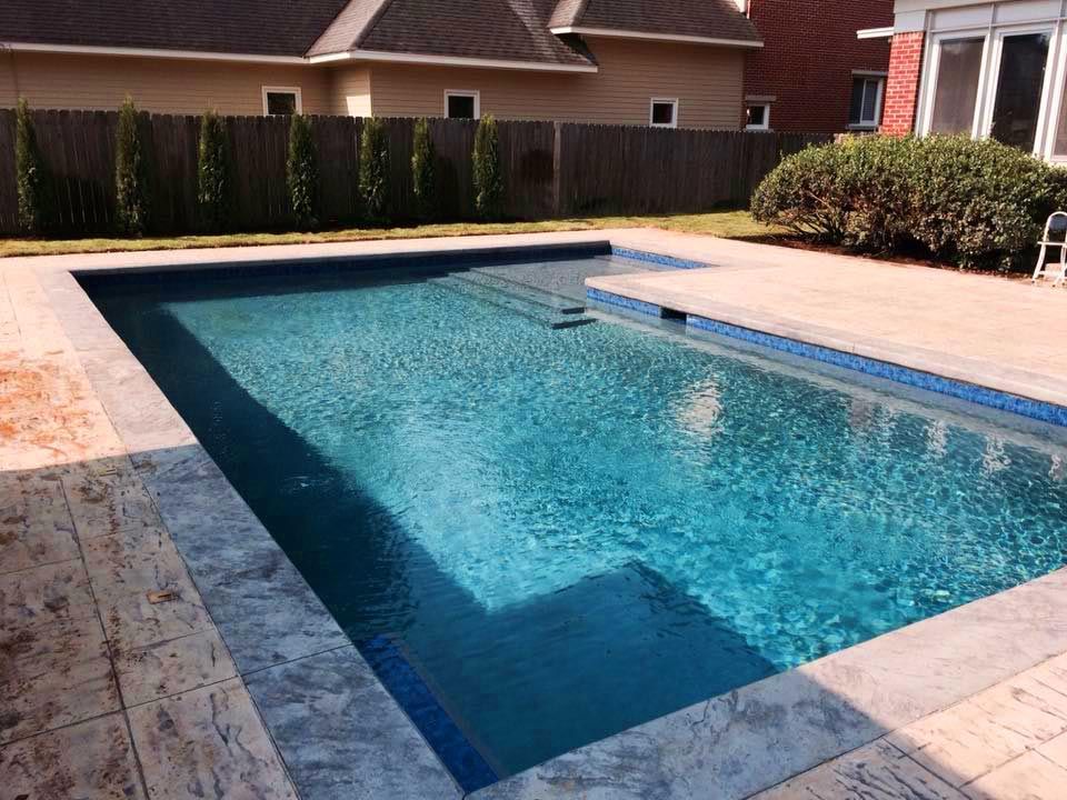 pool cponstruction with marble edging